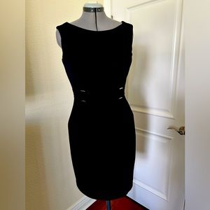 White House Black Market. Black sheath with detailing. Size 10